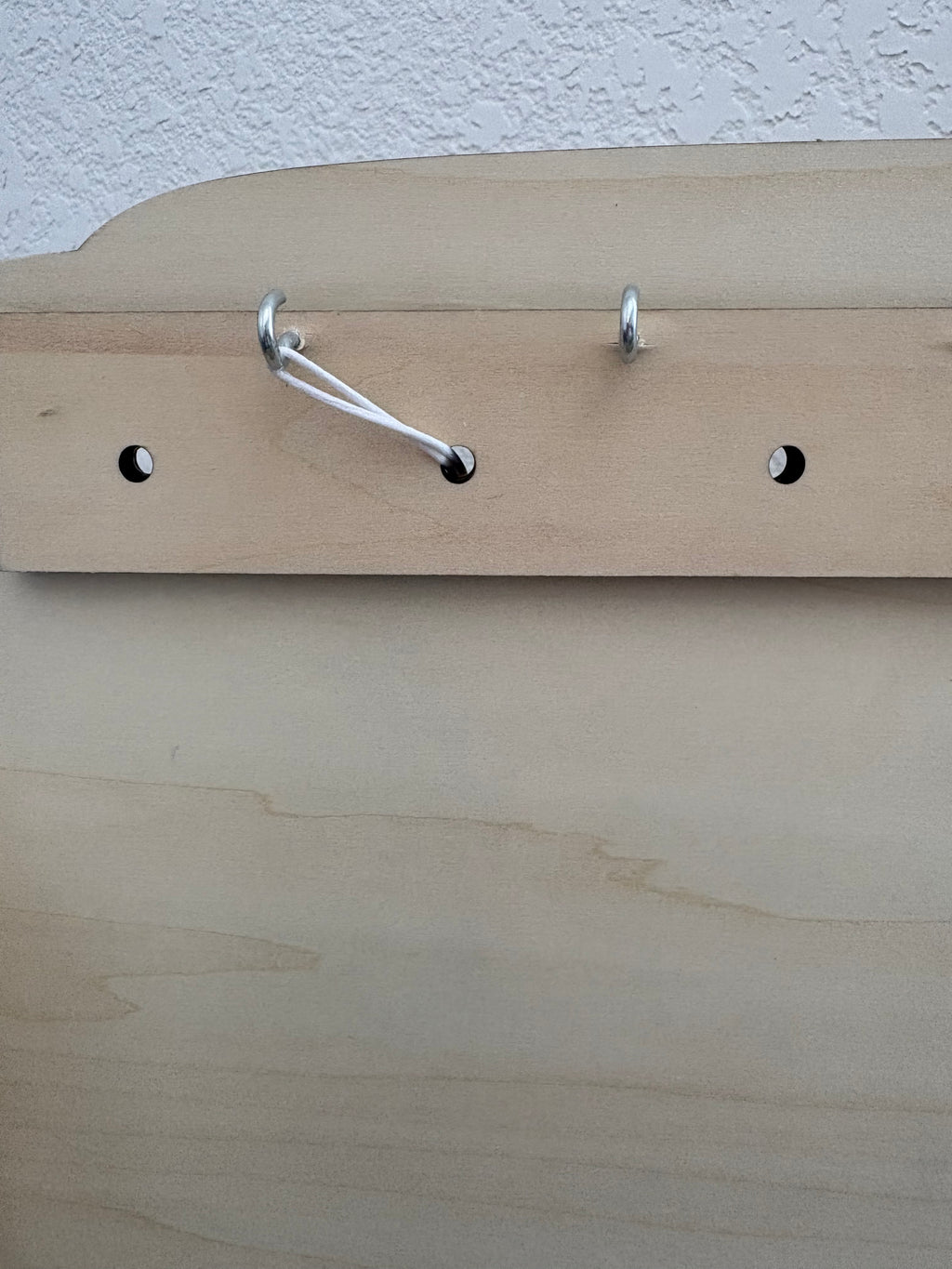 Présentoir attache tétine